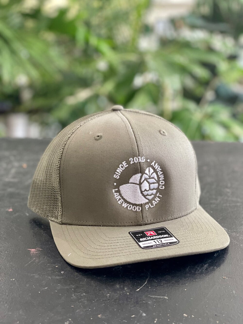 Embroidered White Logo Trucker Hat