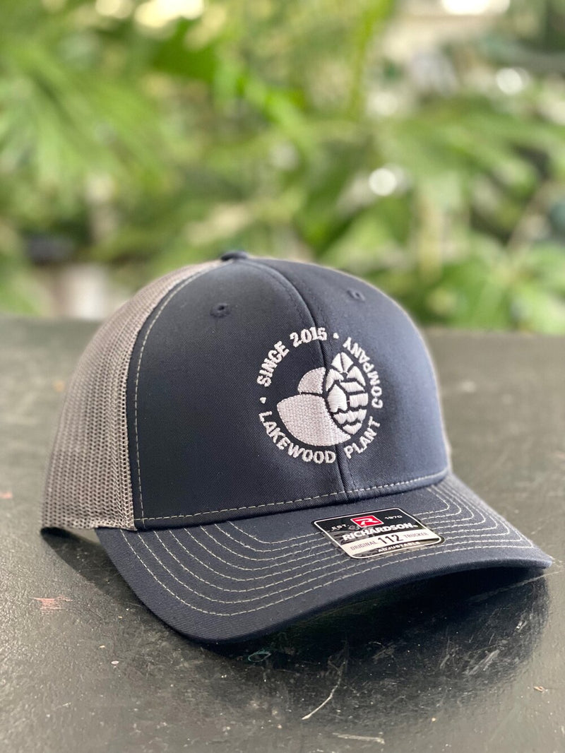 Embroidered White Logo Trucker Hat