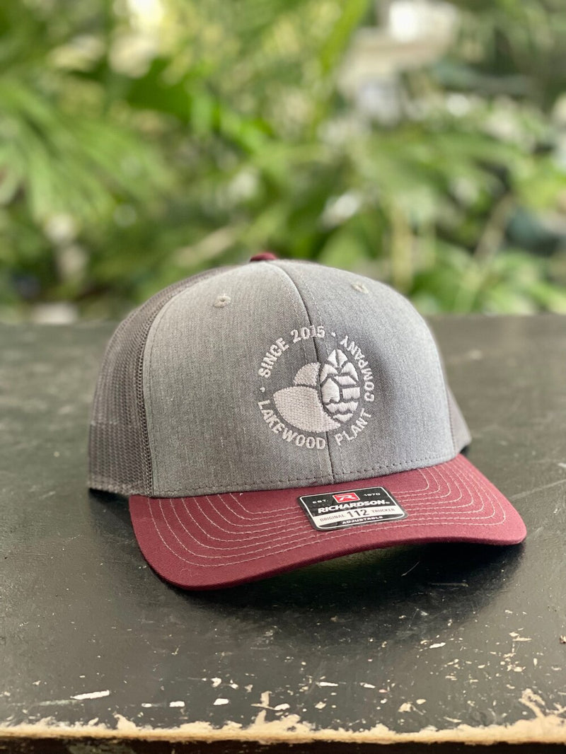 Embroidered White Logo Trucker Hat