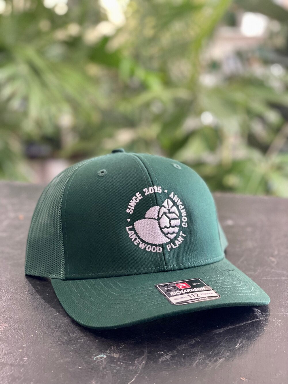 Embroidered White Logo Trucker Hat