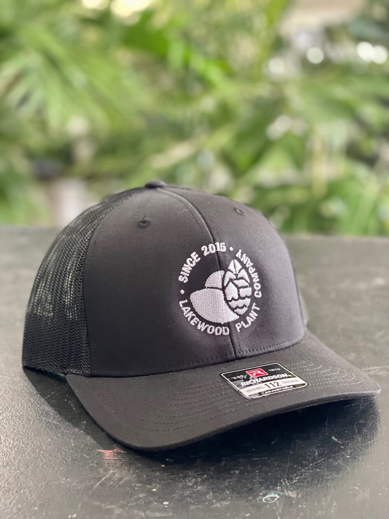 Embroidered White Logo Trucker Hat