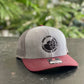 Embroidered Black Logo Trucker Hat